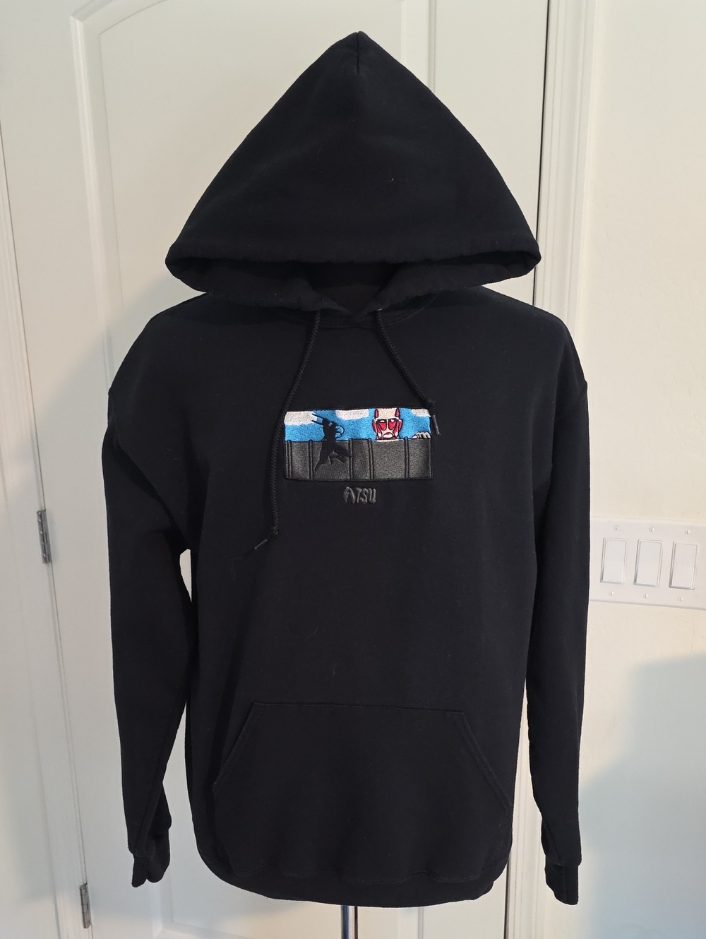 Atsu Black Graphic Pullover Hoodie with Subtle Embroidered Panel